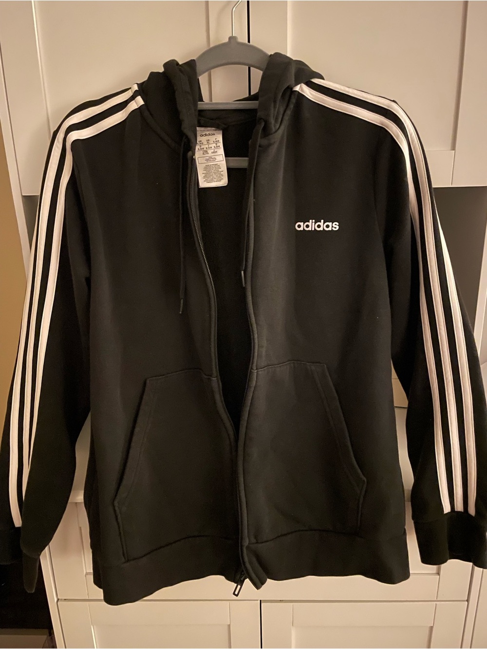 Woman’s Adidas Black Zip-Up Hoodie with White Three-Stripes